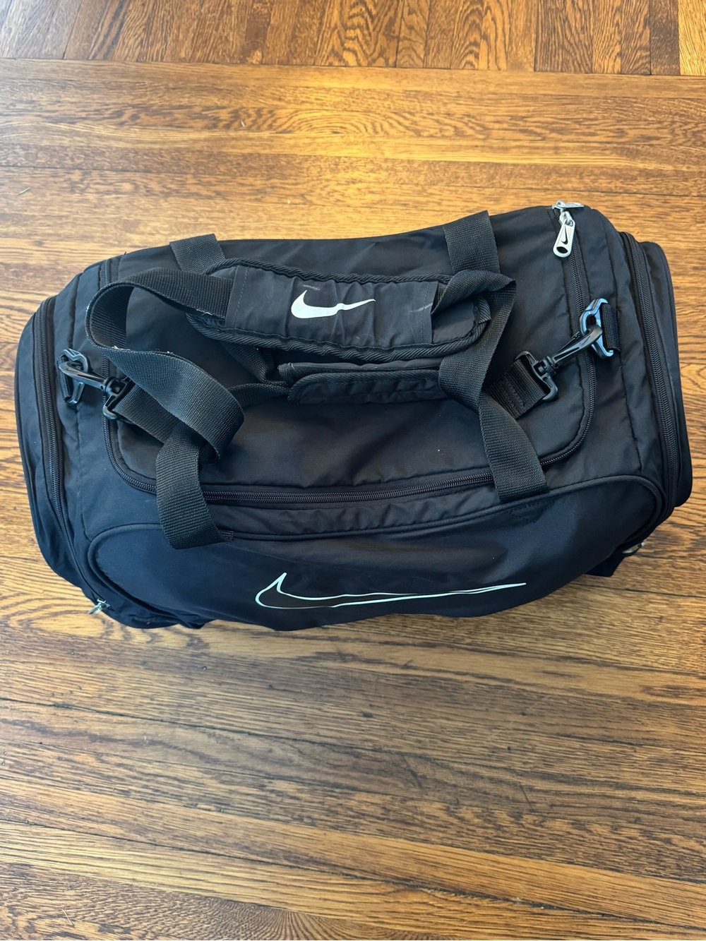 Nike Black Duffel Bag with White Swoosh